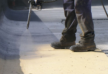Coating systems over Sioux Falls spray foam roof systems